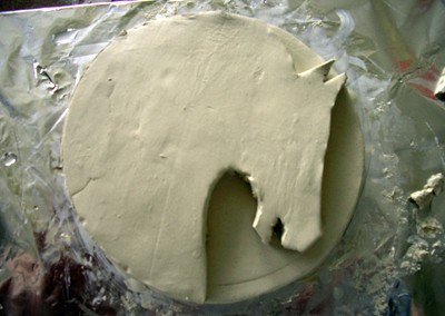 Adding the head to the base...